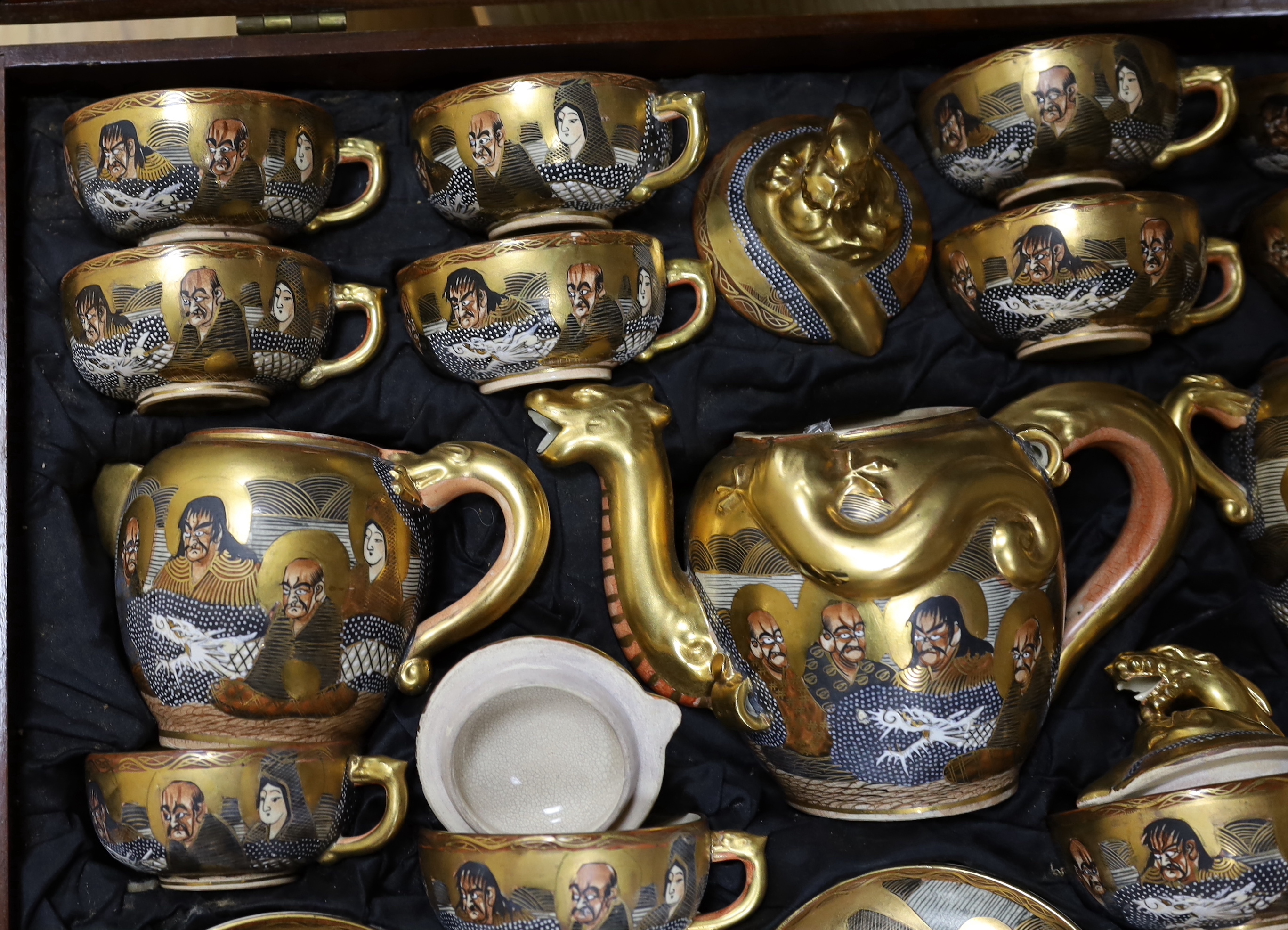 A large mahogany cased set of early 20th century Satsuma teaware